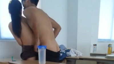 High school couple secretly having sex in the classroom after school 1