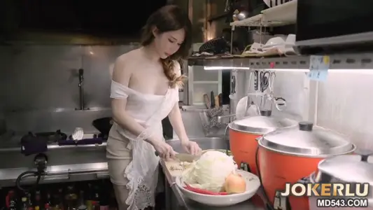 Sin Yuri while busy in the restaurant kitchen